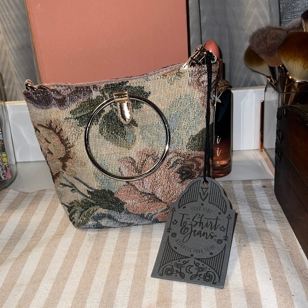 Small floral embroiderd hand bag  with gold embellishments